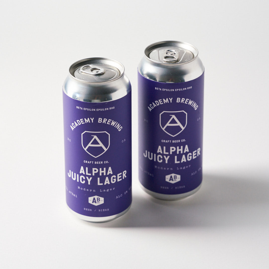 Academy brewing alpha juicy lager cans on white background