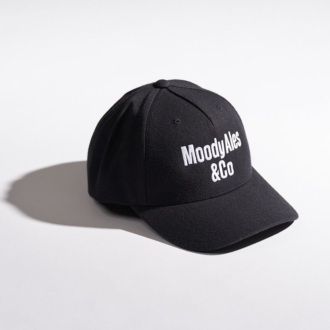 black cap with moody ales & co logo